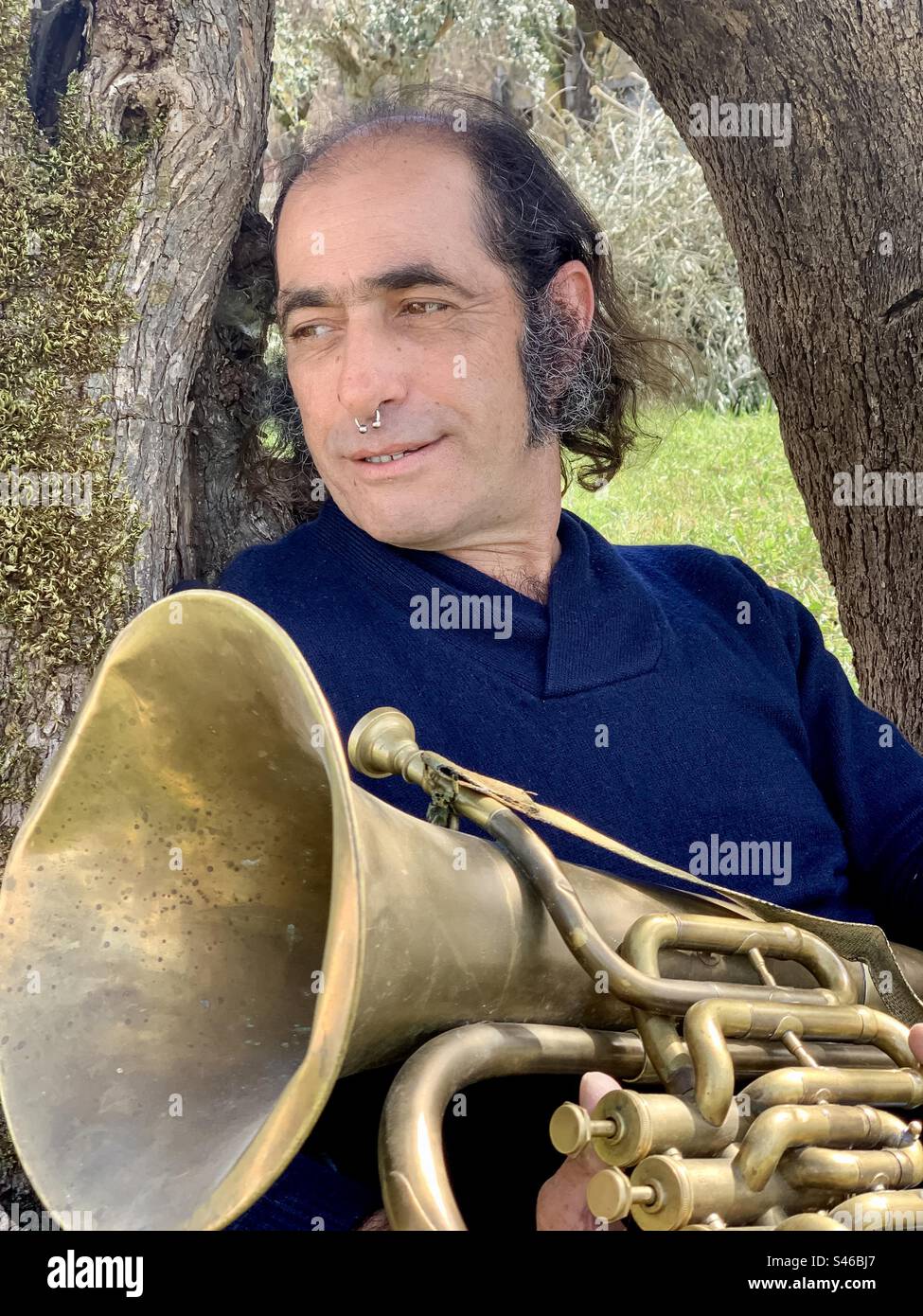A man and his tuba - Smartphone Captured Stock Image