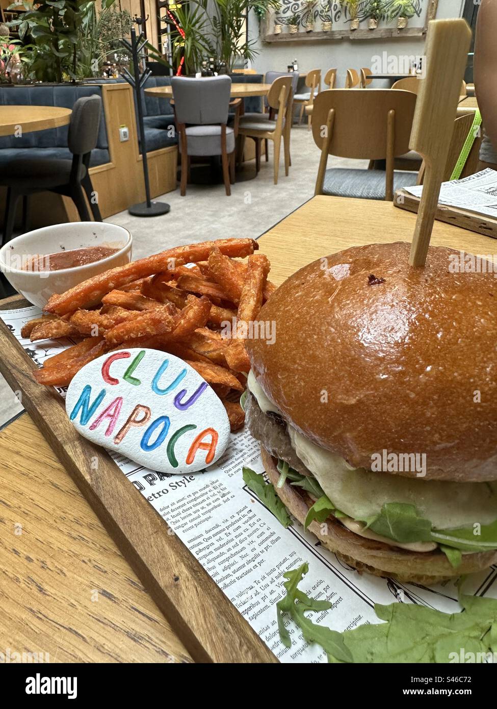 Fast food in a modern restaurant of Cluj Napoca, Transylvania, Romania - Smartphone Captured Stock Image