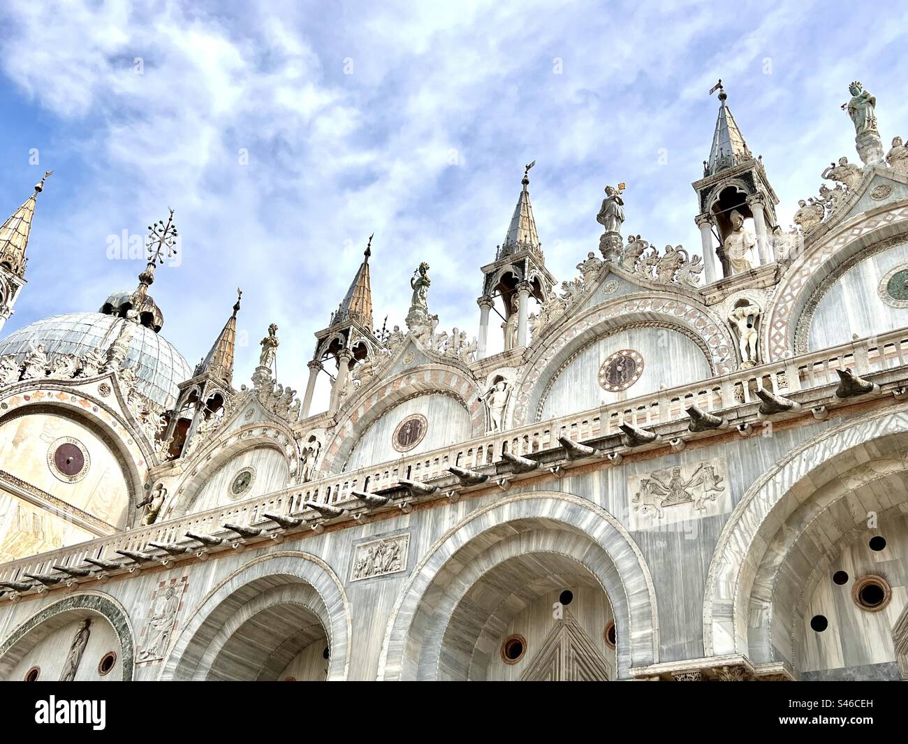 Beautifully ornate roofline and fine of Basilica di San Marco - Smartphone Captured Stock Image