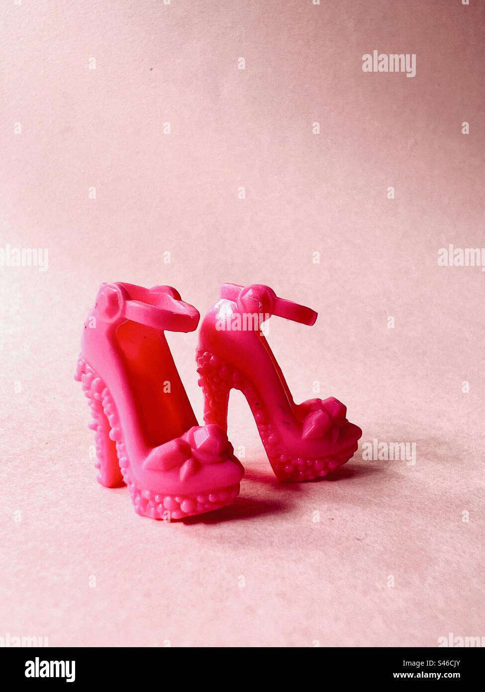 High heeled hot pink Barbie doll shoes Stock Photo