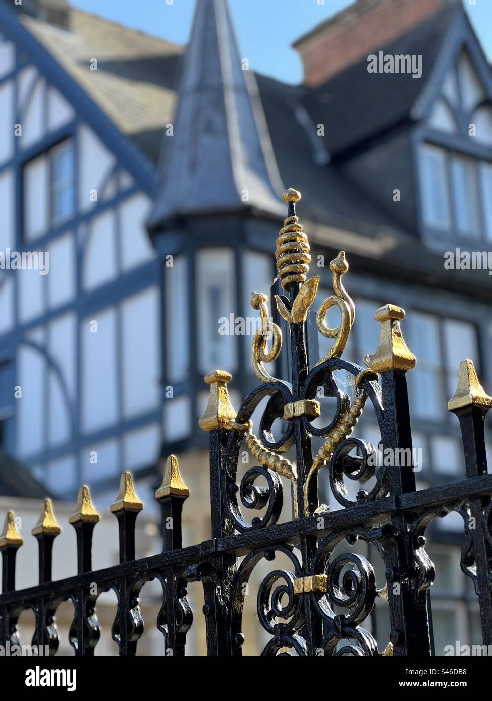Golden guilt work against historical black and white buildings of Chester England Stock Photo