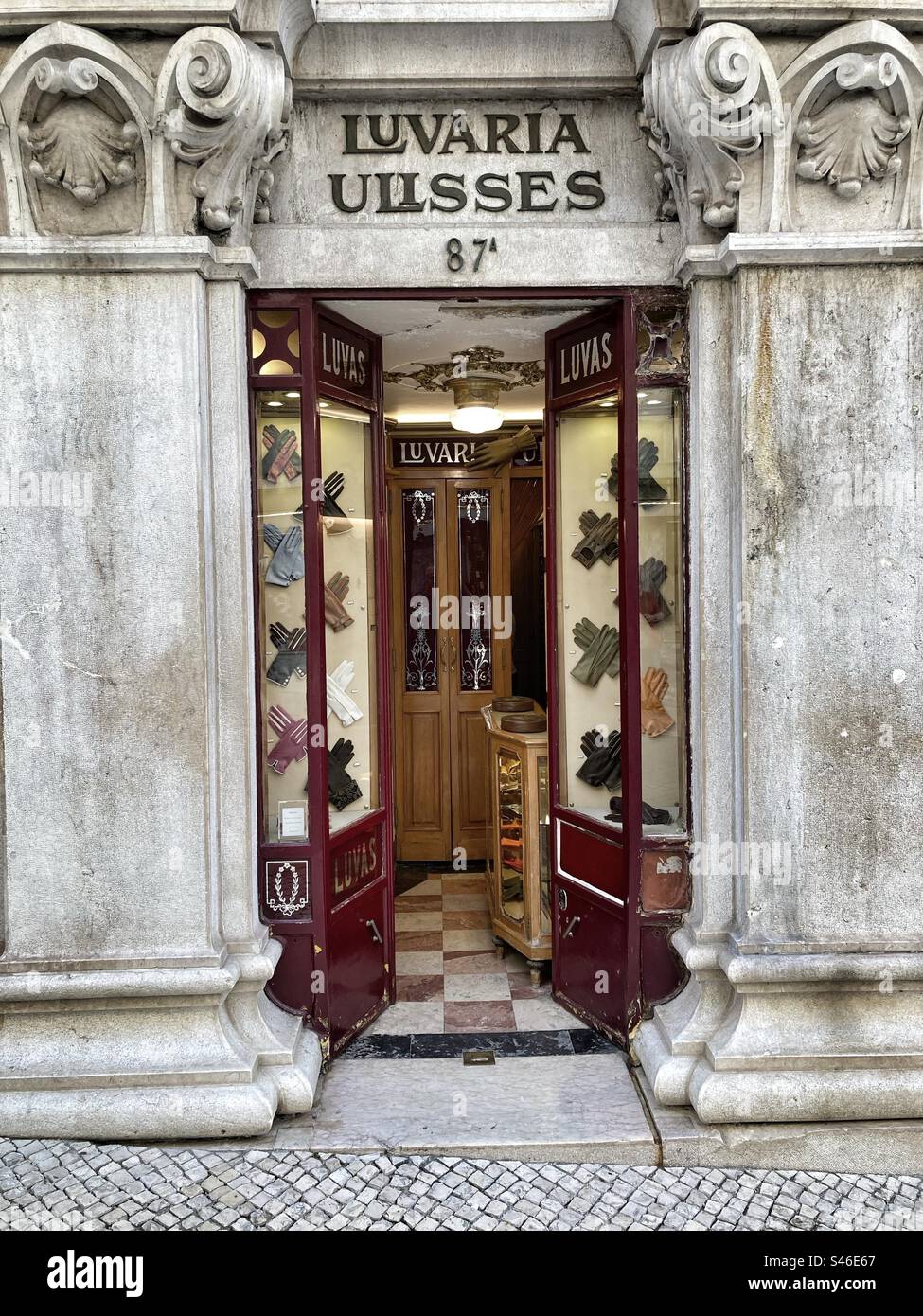 Traditional Ulisses Glove Shop ( the only one in Portugal manufacturing themselves the handcrafted items of high quality leather ) in Chiado area of Lisbon ( downtown). - Smartphone Captured Stock Image