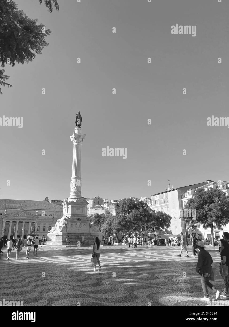 Praça do Rossio in Lisbon downtown also known as Praça de D.Pedro it’s a busy and central area of Lisbon, capital city of Portugal ( here in monochromatic tone). - Smartphone Captured Stock Image