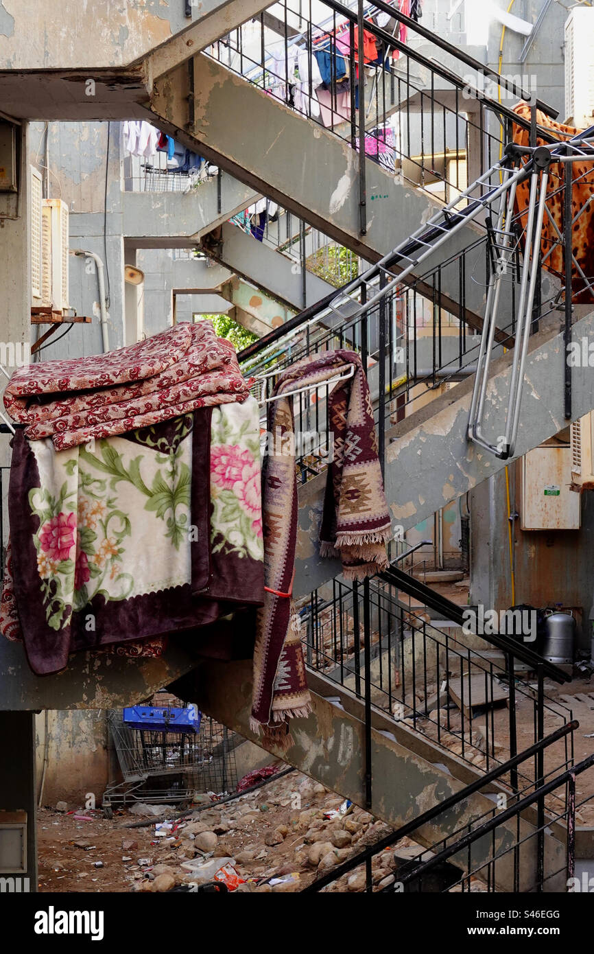 Clothesline between buildings Stock Photo Alamy