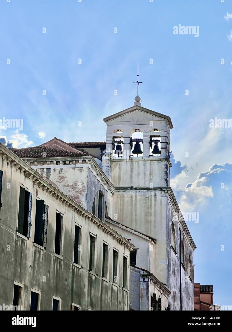 Bell tower at Chiesa di San Marziale church next to Rio della Misericordia, Cannaregio district, Venice - Smartphone Captured Stock Image