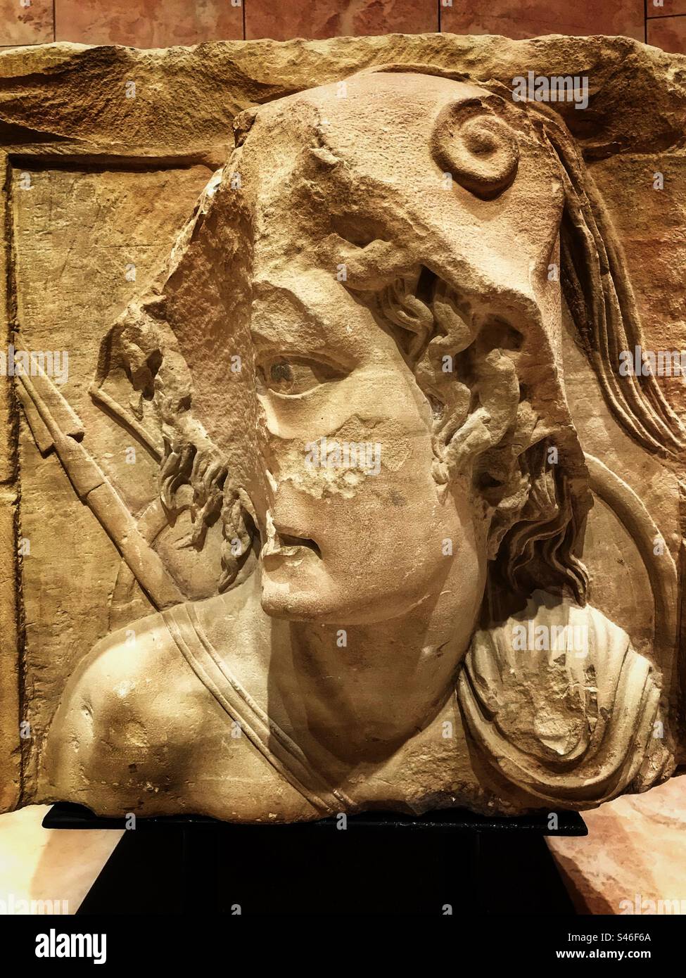 Petra Jordan a damaged limestone carving of Ares the Greek god of war found at the ancient Petra city site in Jordan on display at the Petra Museum - Smartphone Captured Stock Image