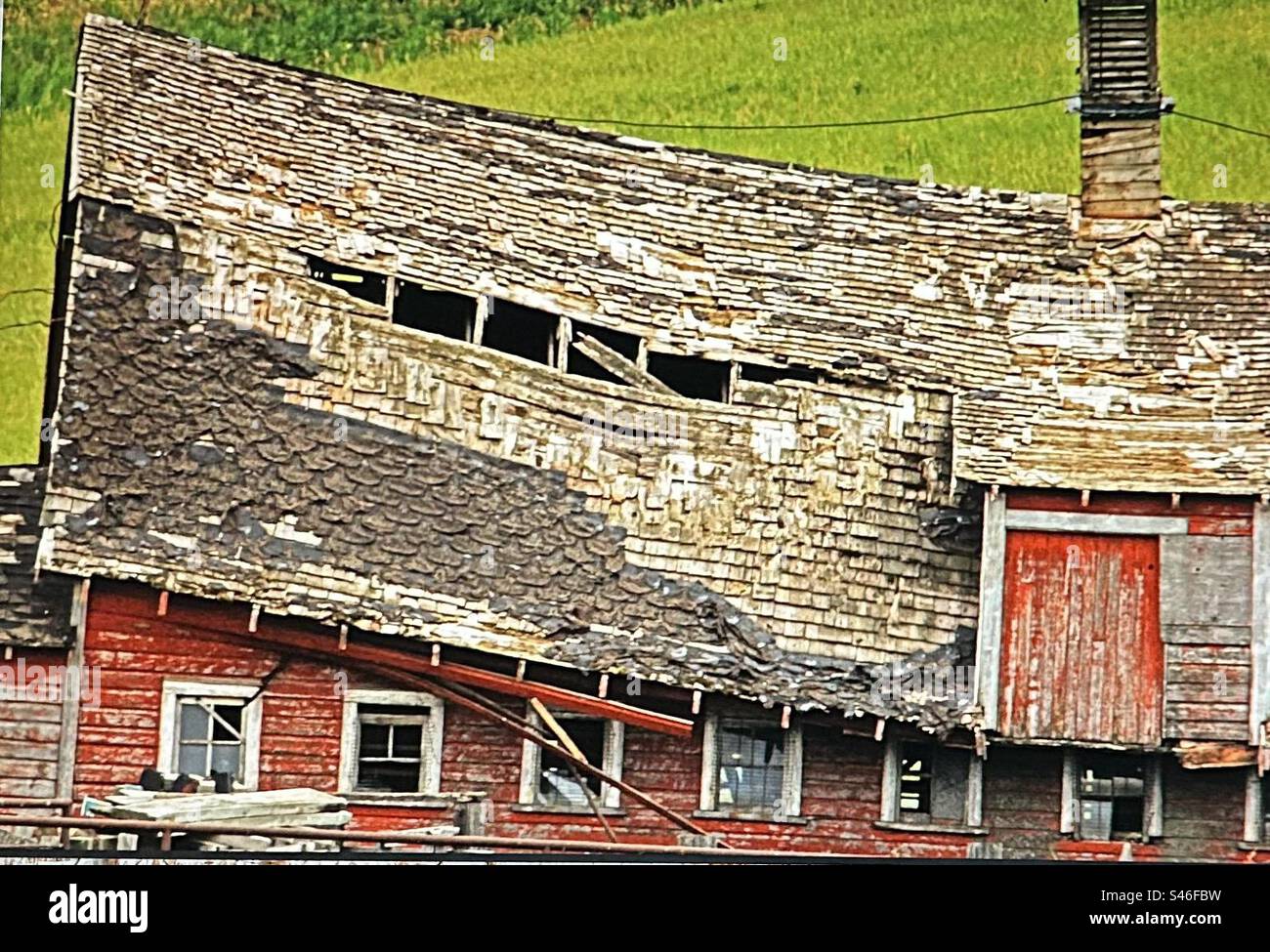 Te east wing, Old barn, historic, deteriorating, sagging, tired, Stock Photo