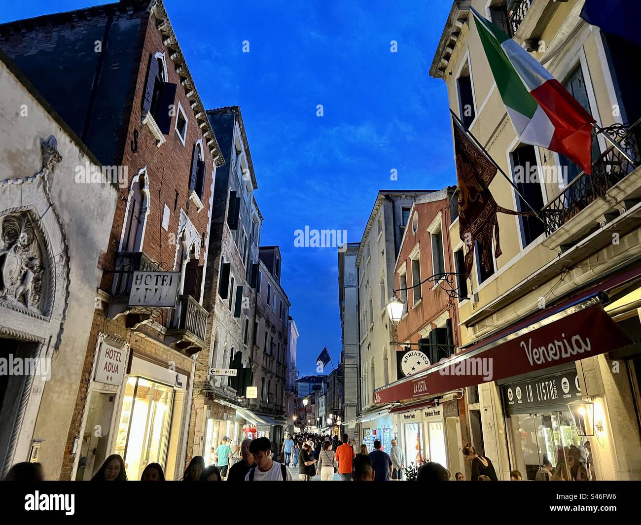 Evening crowd on Rio Tera Lista di Spagna street in the Cannaregio district of Venice - Smartphone Captured Stock Image