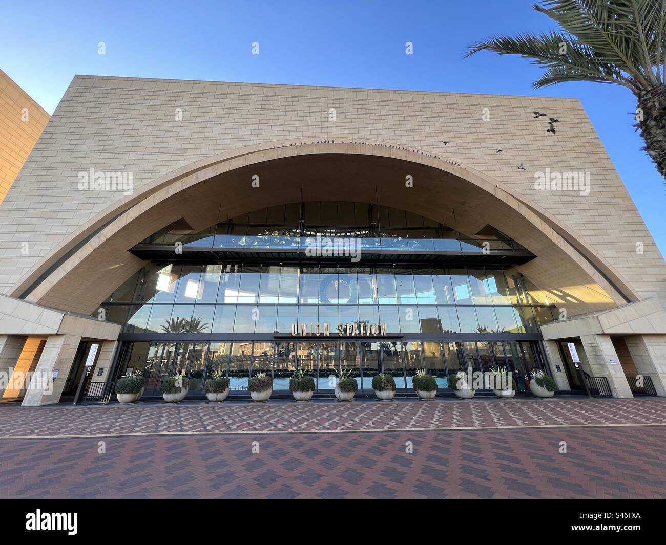 LOS ANGELES, CA, DEC 2022: exterior view of entrance to Union Station in Downtown, seen from Patsaouras Transit Plaza, departure and arrival point for buses and coaches - Smartphone Captured Stock Image