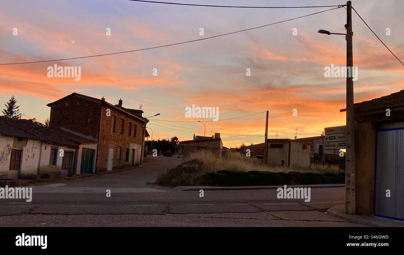 Sunset in a Spanish village with houses and bodegas and a dramatic sky Lantadilla Palencia Spain - Smartphone Captured Stock Image