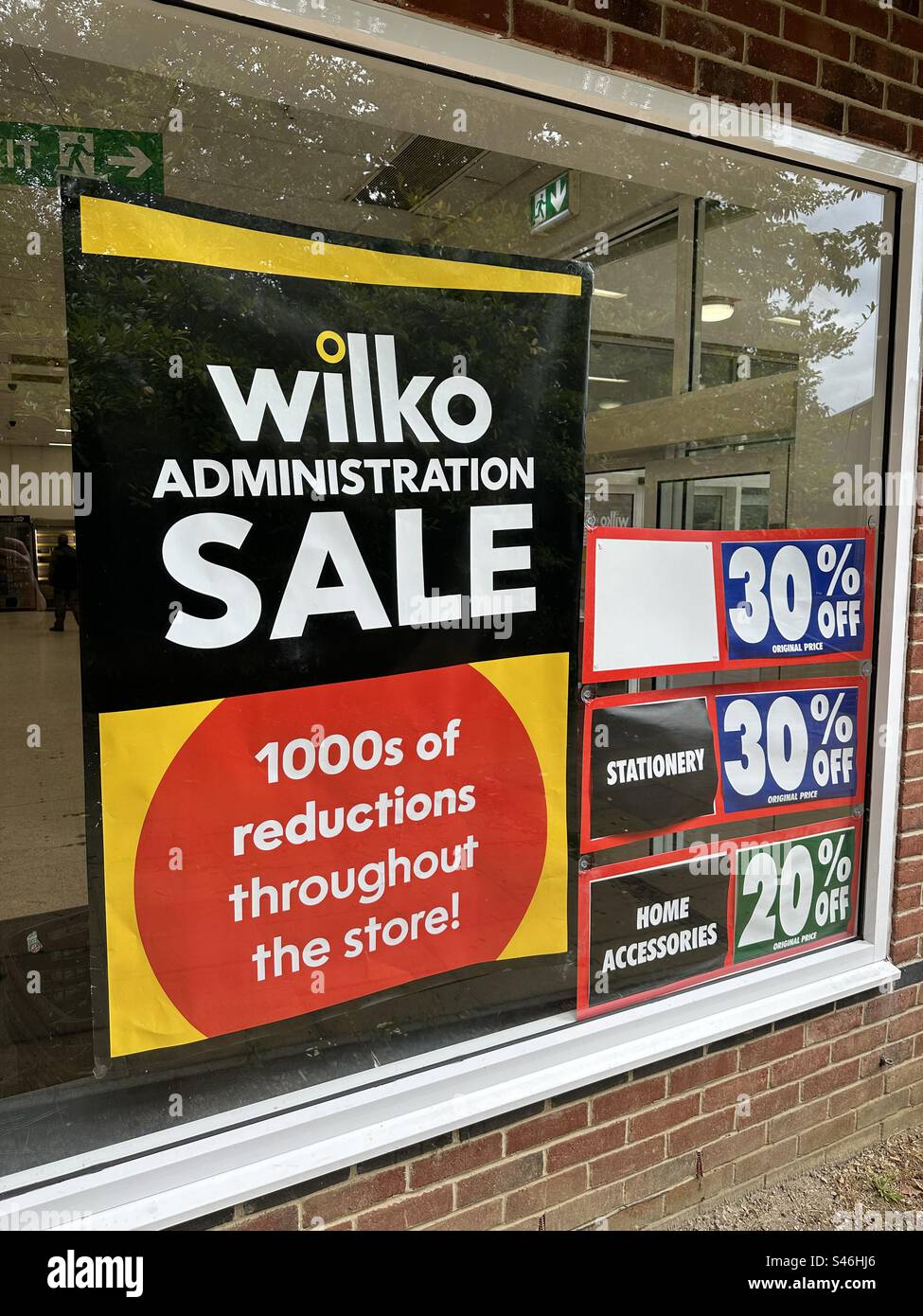 Wilko store window in Bordon, Hampshire displaying ‘ADMINISTRATION SALE’ Stock Photo