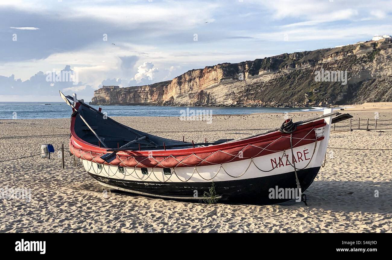 Row boat Nazaré on the beach of the same name - Smartphone Captured Stock Image