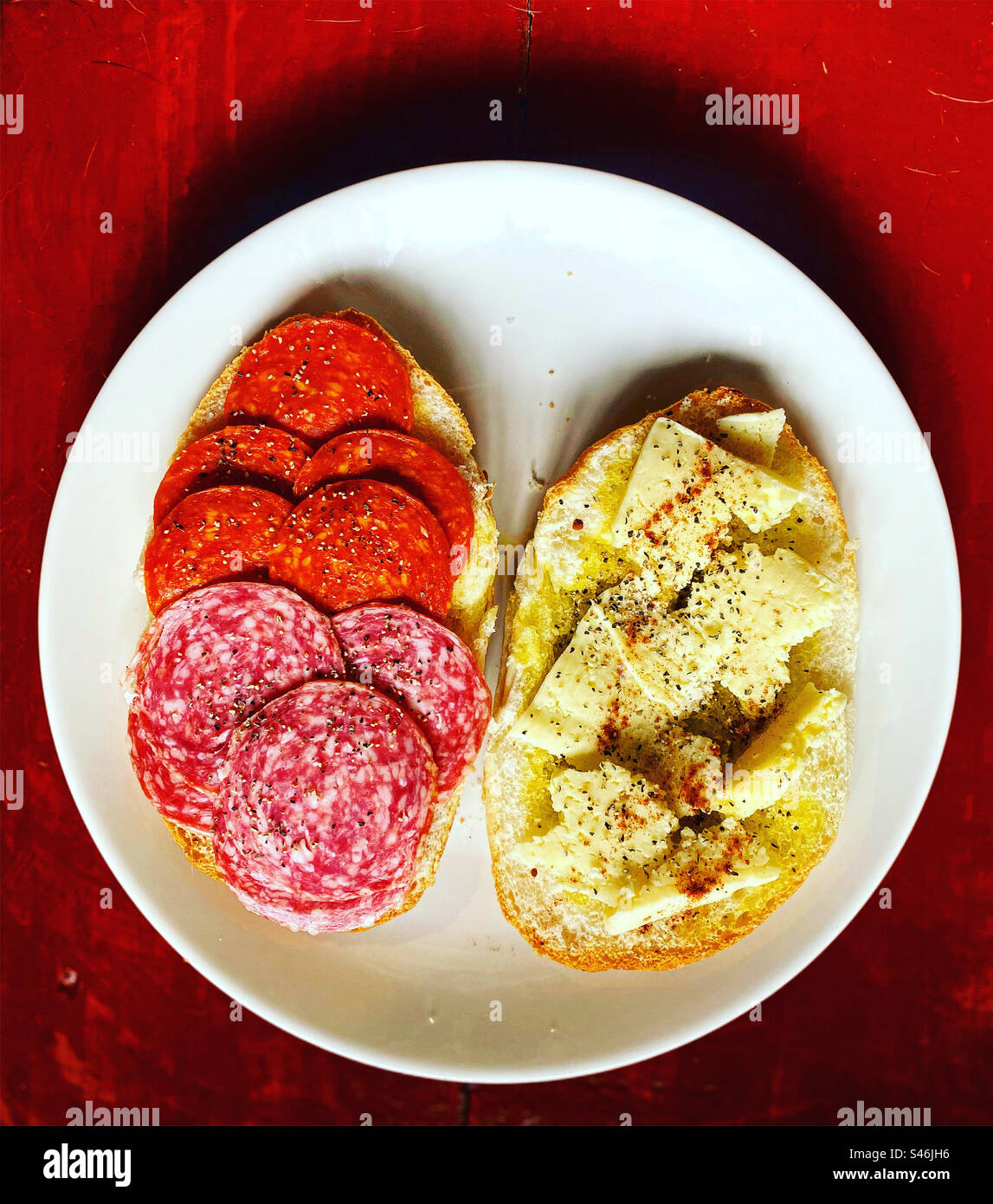 A sandwich with salami, Spanish chorizo and cheese for lunch in ...