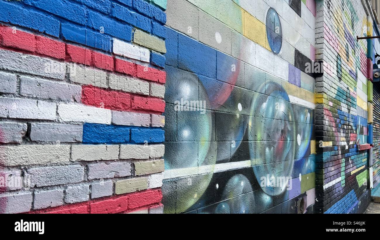 LOS ANGELES, CA, JAN 2023: detail of colorful, spray painted mural on wall in Arts District, Downtown Stock Photo