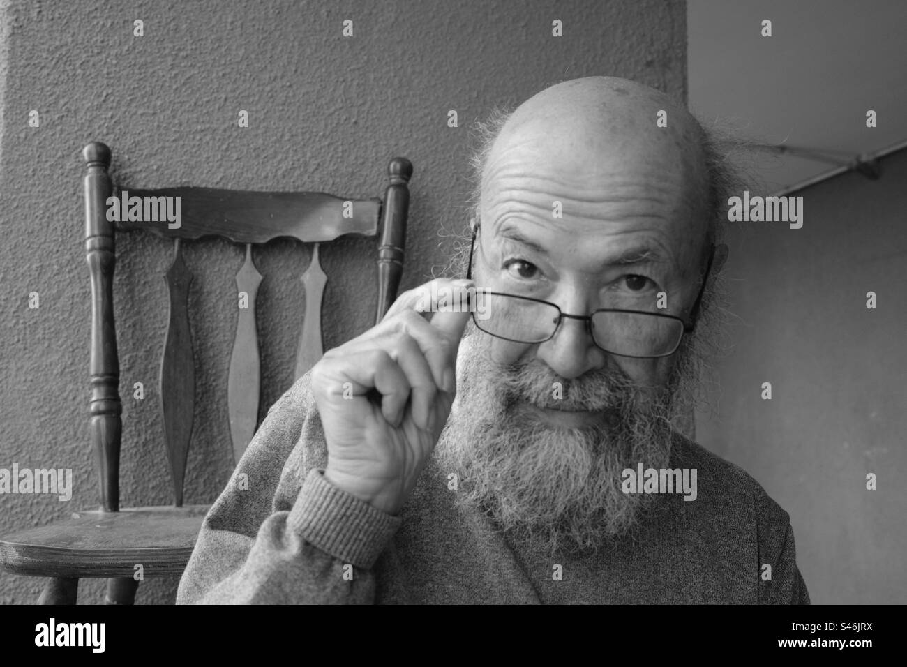 Monochrome Portrait of senior man looking at camera Stock Photo
