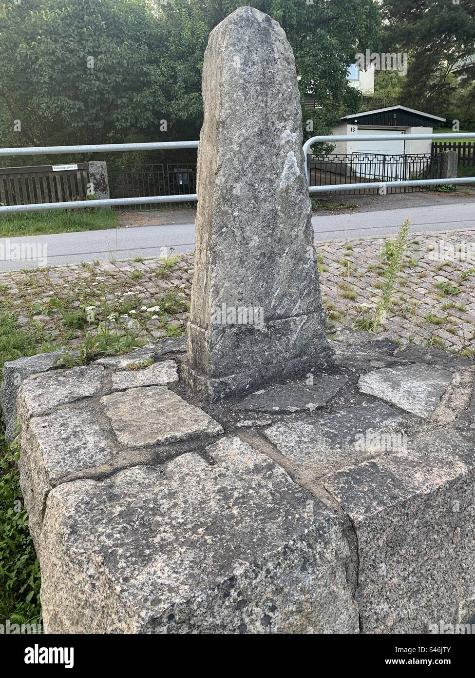 Old distance measuring stone on stone foundation Stock Photo Alamy