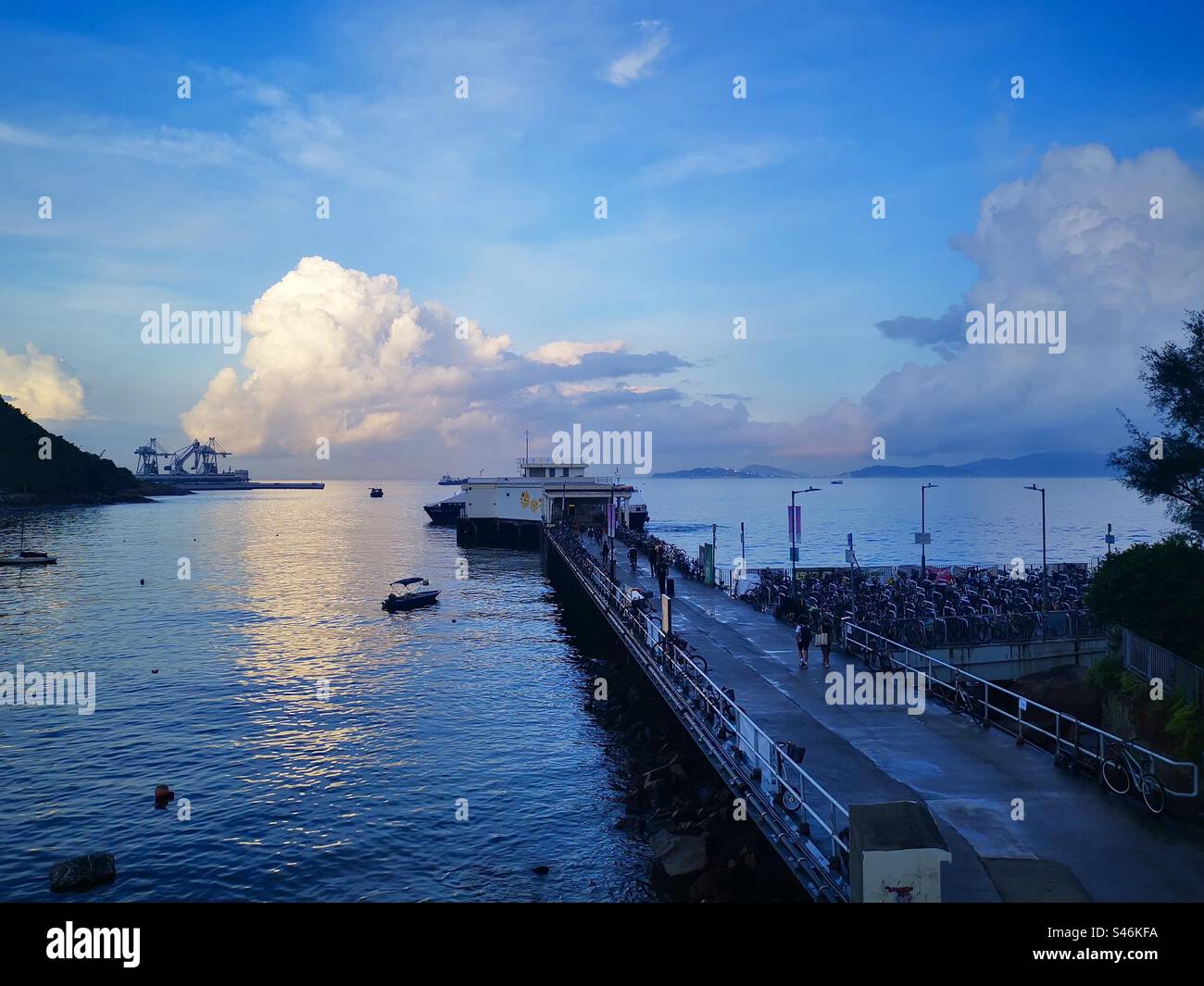 Yung Shue Wan ferry pier on Lamma island, Hong Kong. - Smartphone Captured Stock Image