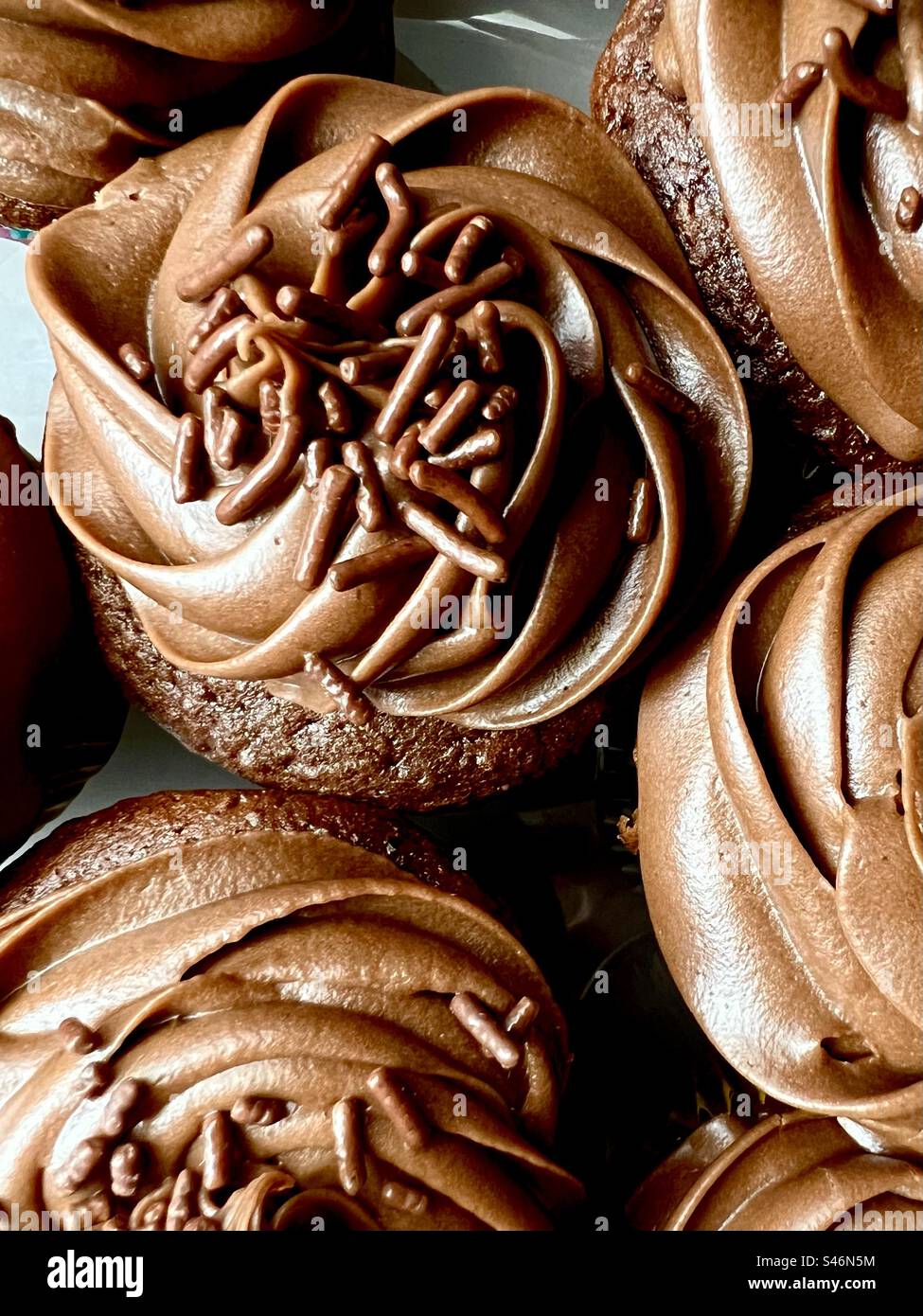 Full frame of chocolate cupcakes Stock Photo