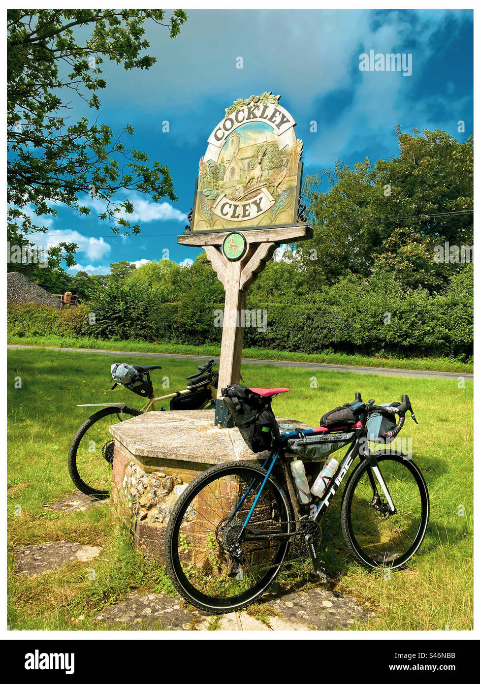 Two bikepacking bicycles resting at a small Norfolk village in England - Smartphone Captured Stock Image