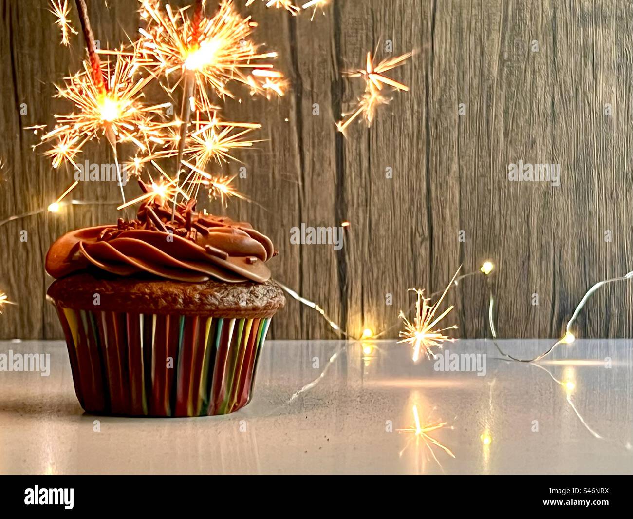 Chocolate cupcake with sparklers - Smartphone Captured Stock Image