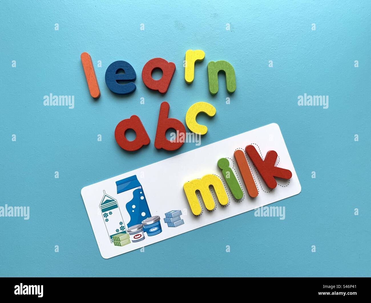 Colourful alphabet to learn ABC using flashcards. Top view background