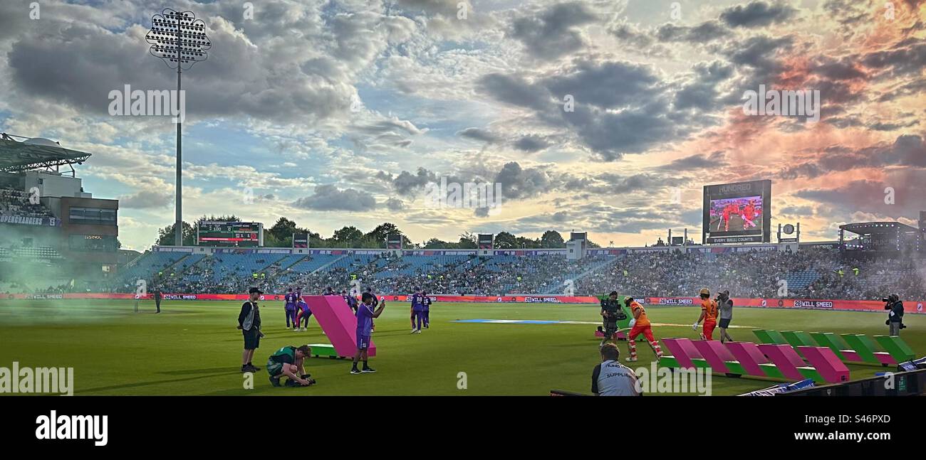 The Birmingham Phoenix opening batsmen enter the field as they prepare to face the Northern Superchargers bowling attack. The Hundred 3.8.23 - Headingley Stadium, Leeds, Yorkshire County Cricket Club. Stock Photo