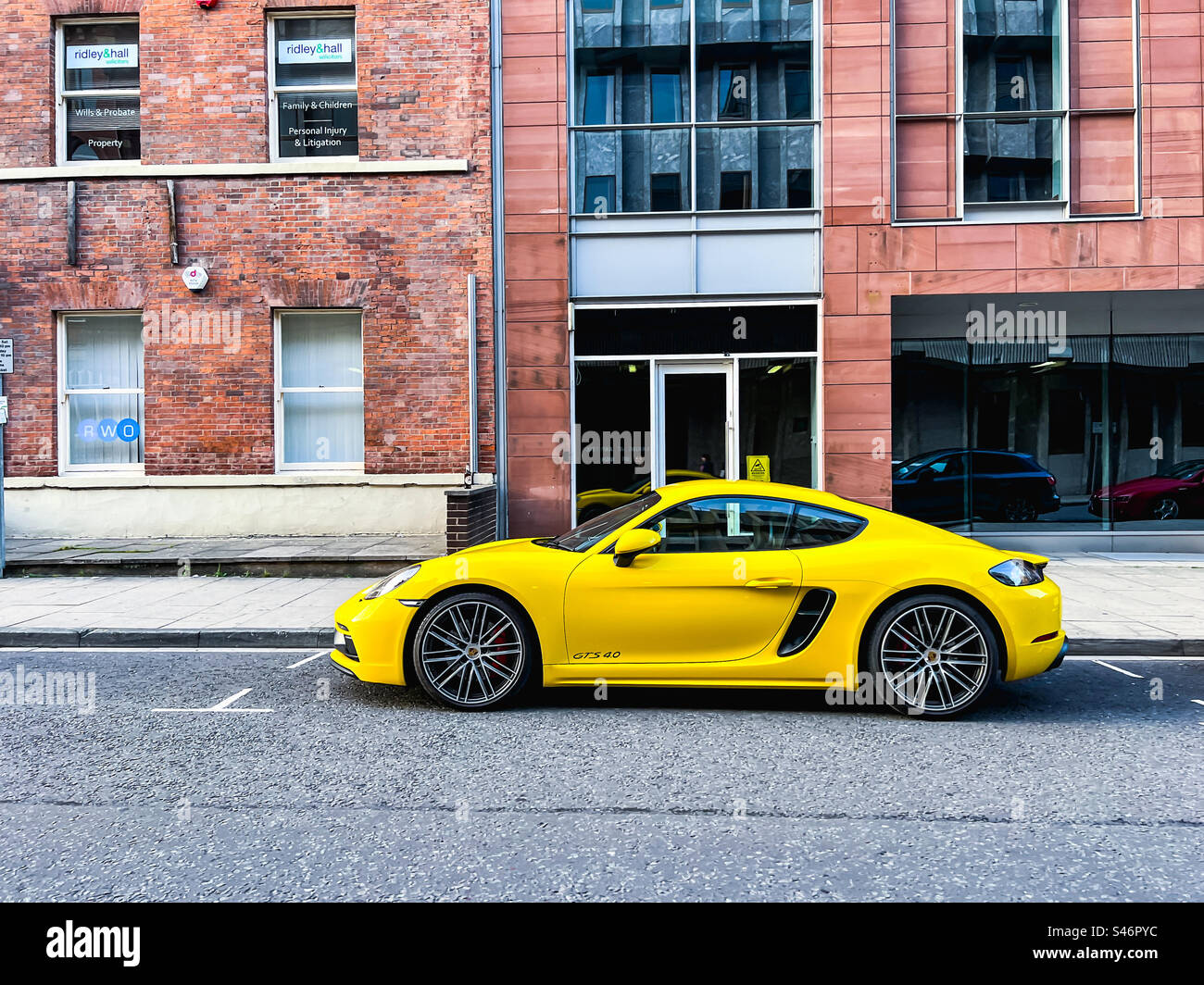 Yellow Porsche 718 GTS 4.0 car parked - Smartphone Captured Stock Image