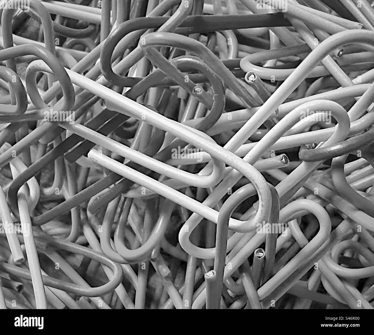 ‘Paper Clip Puzzle’ a close up of a large bundle of paperclips in a