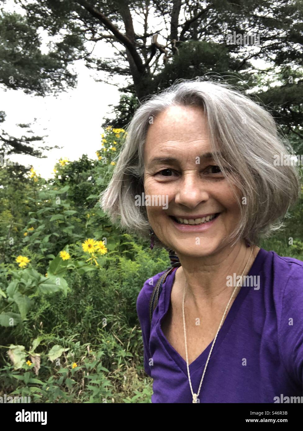 Happy woman in nature hi-res stock photography and images - Alamy