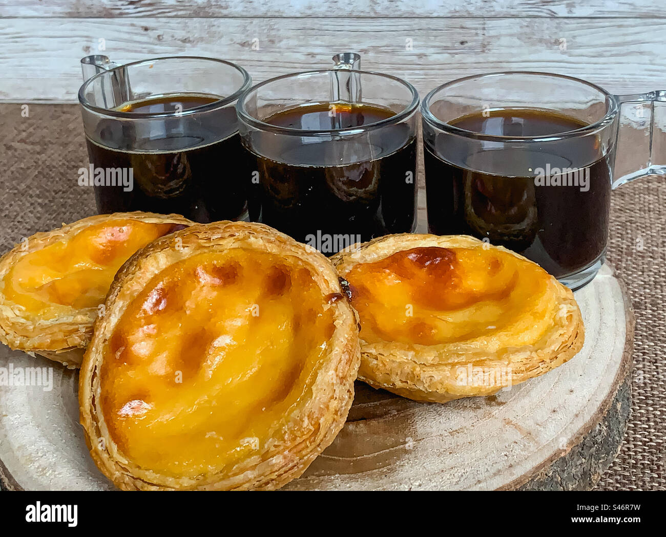 Black coffee and pastéis de nata - Smartphone Captured Stock Image