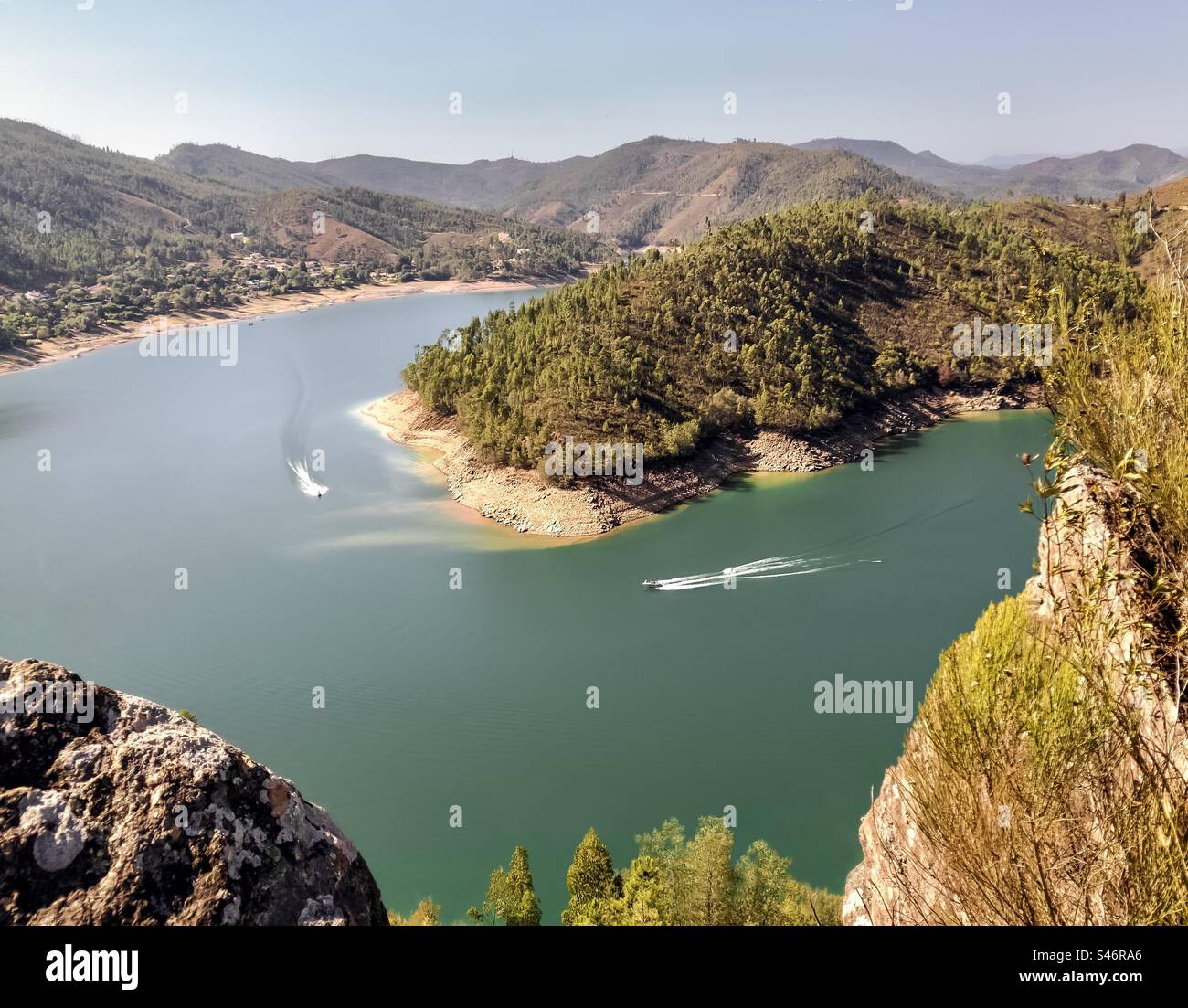 The view Miradouro da Pedra da Malhada with boats on the river - Smartphone Captured Stock Image