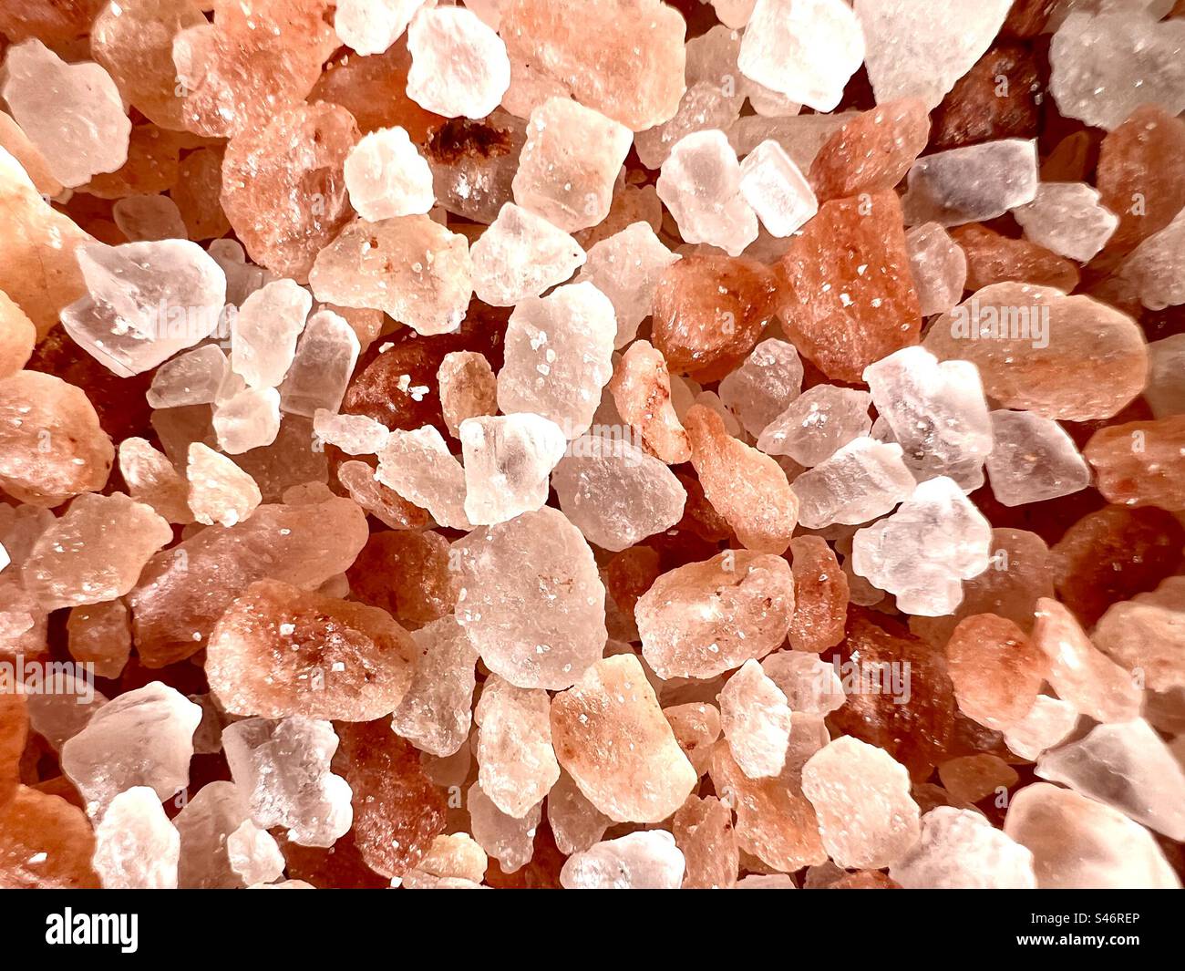Close up full frame of coarse pink Himalayan salt crystals - Smartphone Captured Stock Image