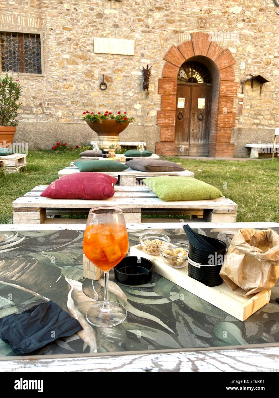 Weekend night setup for socializing in the courtyard area of Castello di Montegibbio in Sassuolo - Smartphone Captured Stock Image