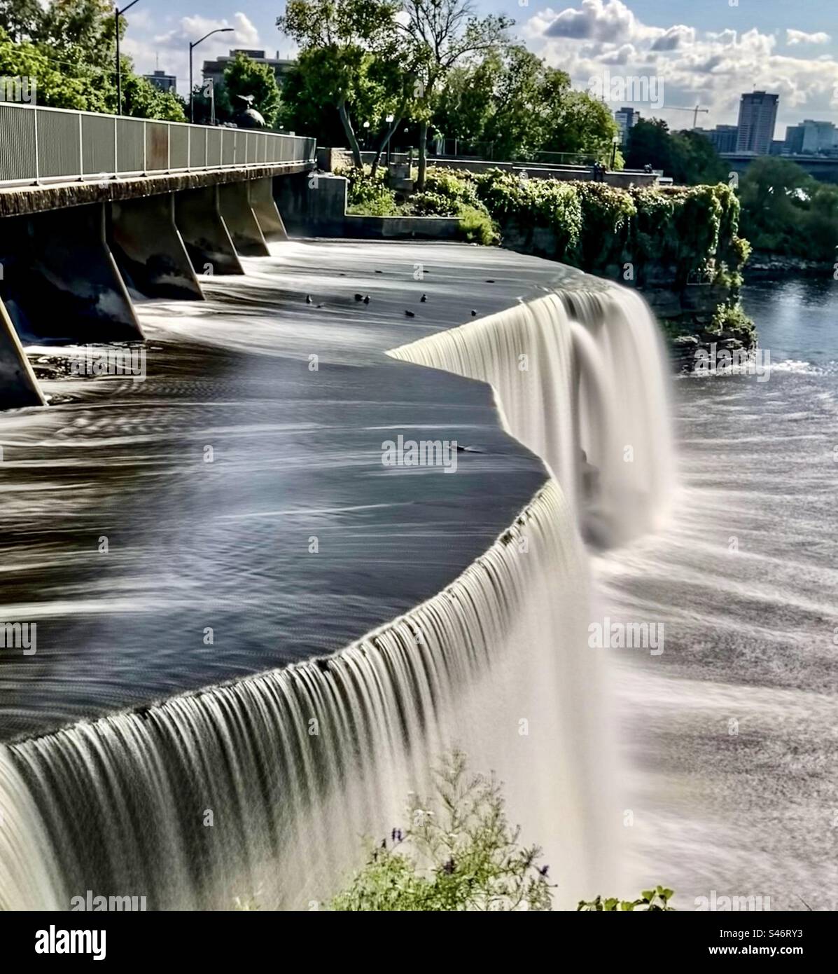 Rideau Falls in the late summer sun in long exposure. - Smartphone Captured Stock Image