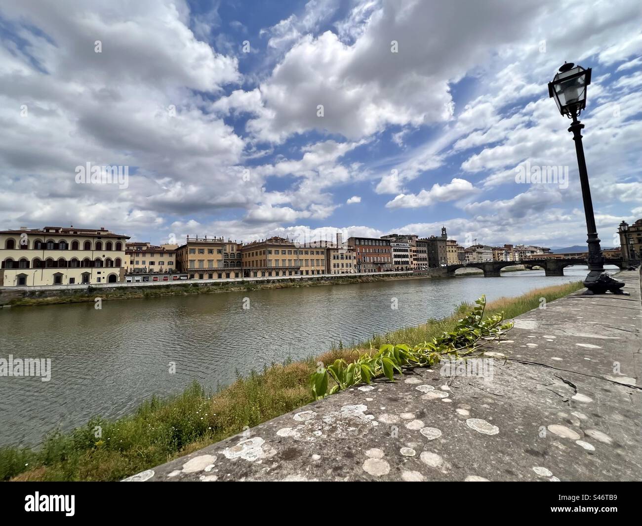 Arno River runs through the Centro Storico of Florence, Italy - Smartphone Captured Stock Image