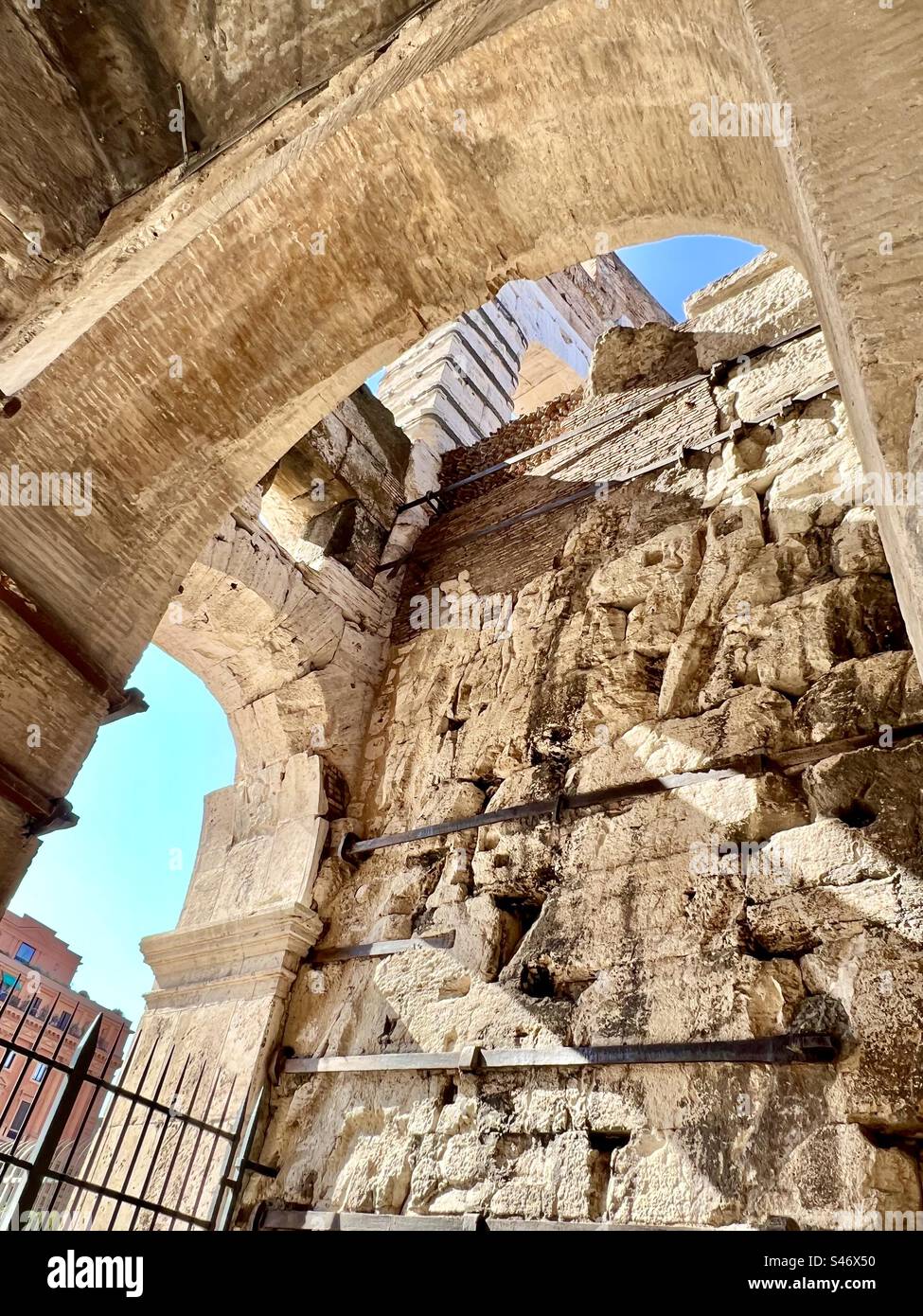 The impressive ancient architecture of the Roman Colosseum. - Smartphone Captured Stock Image