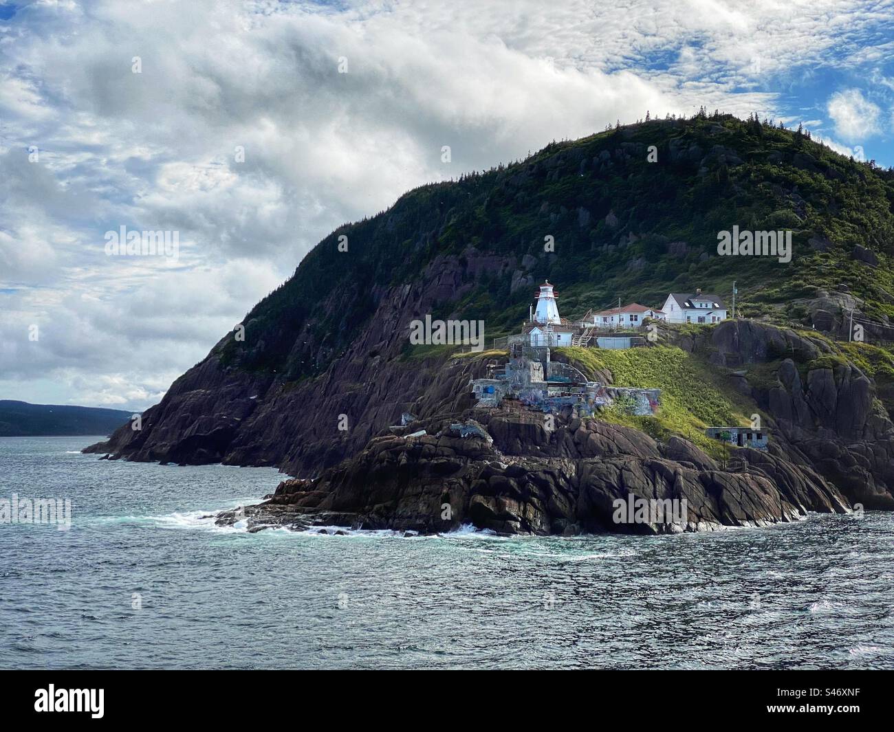 Lighthouse at the Narrows entrance to the harbor at Saint John’s, Newfoundland Stock Photo