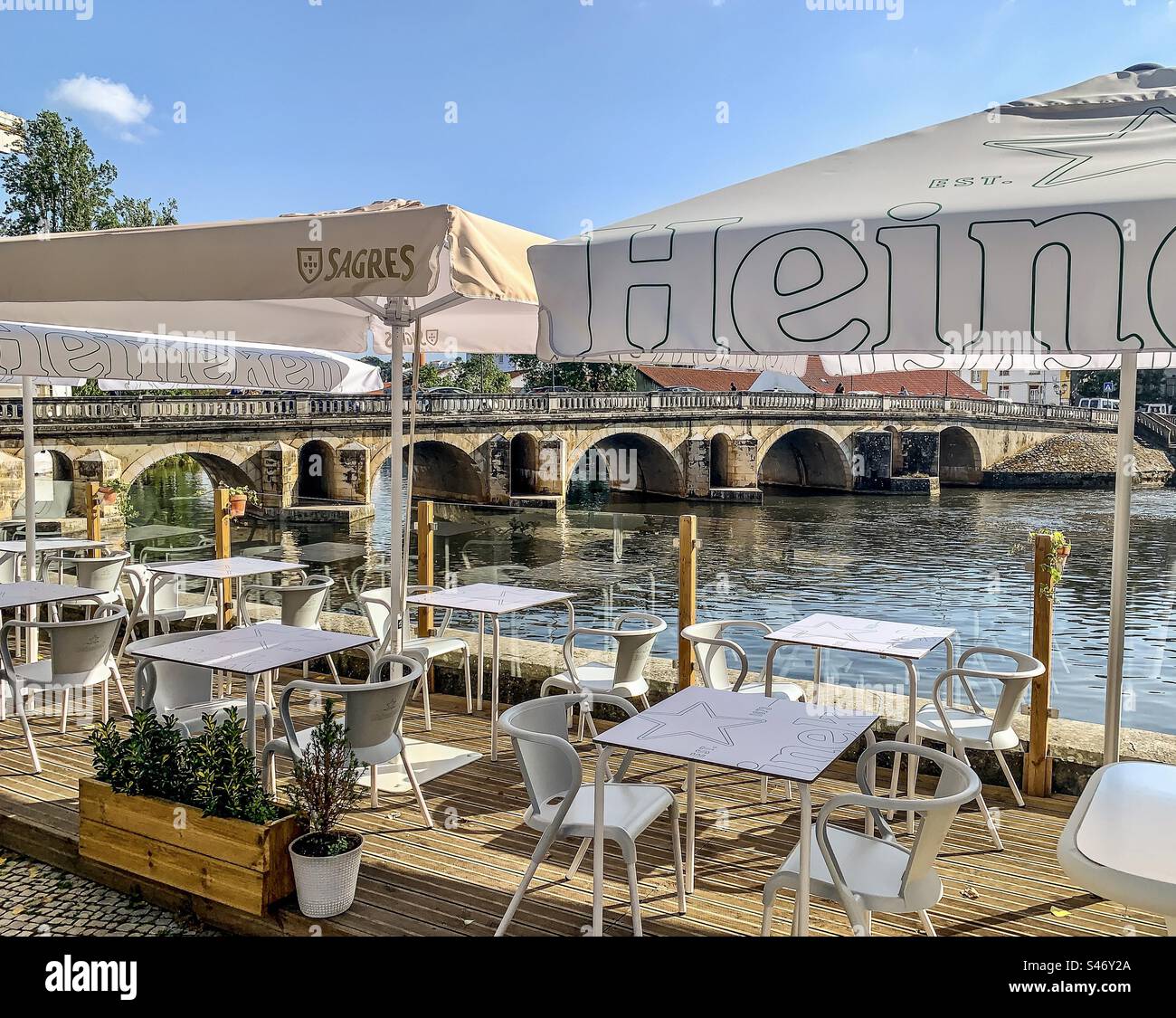 A view of a cafe overlooking the Rio Nabão, Tomar Portugal - Smartphone Captured Stock Image