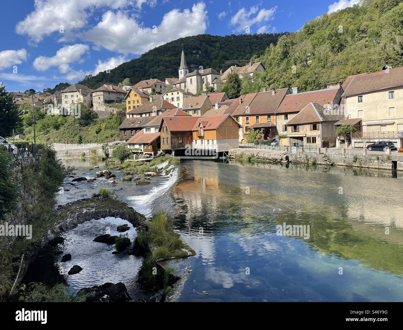 Town Lods on river La Loue, Jura, France Stock Photo