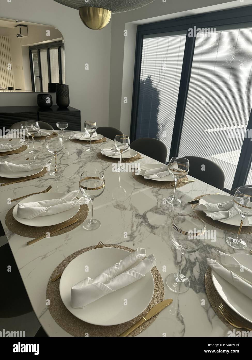 Gold and white table setting - Smartphone Captured Stock Image