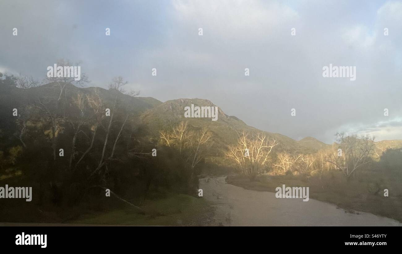 Misty view of Santa Monica Mountains and river in early morning, Southern California - Smartphone Captured Stock Image