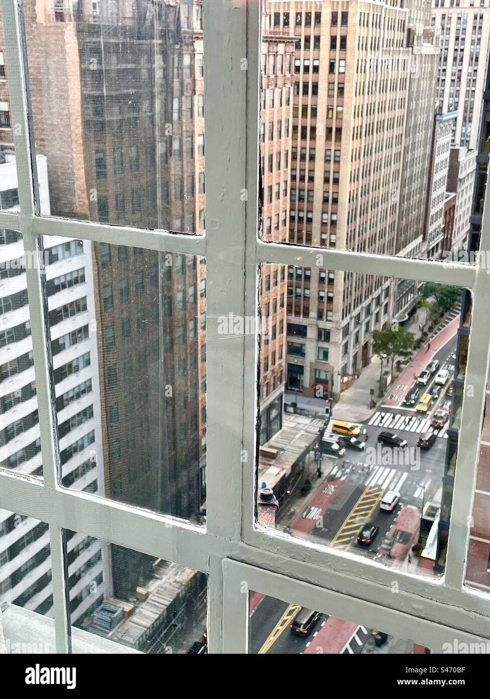 Iconic Cityview out of an apartment window in New York City, - Smartphone Captured Stock Image