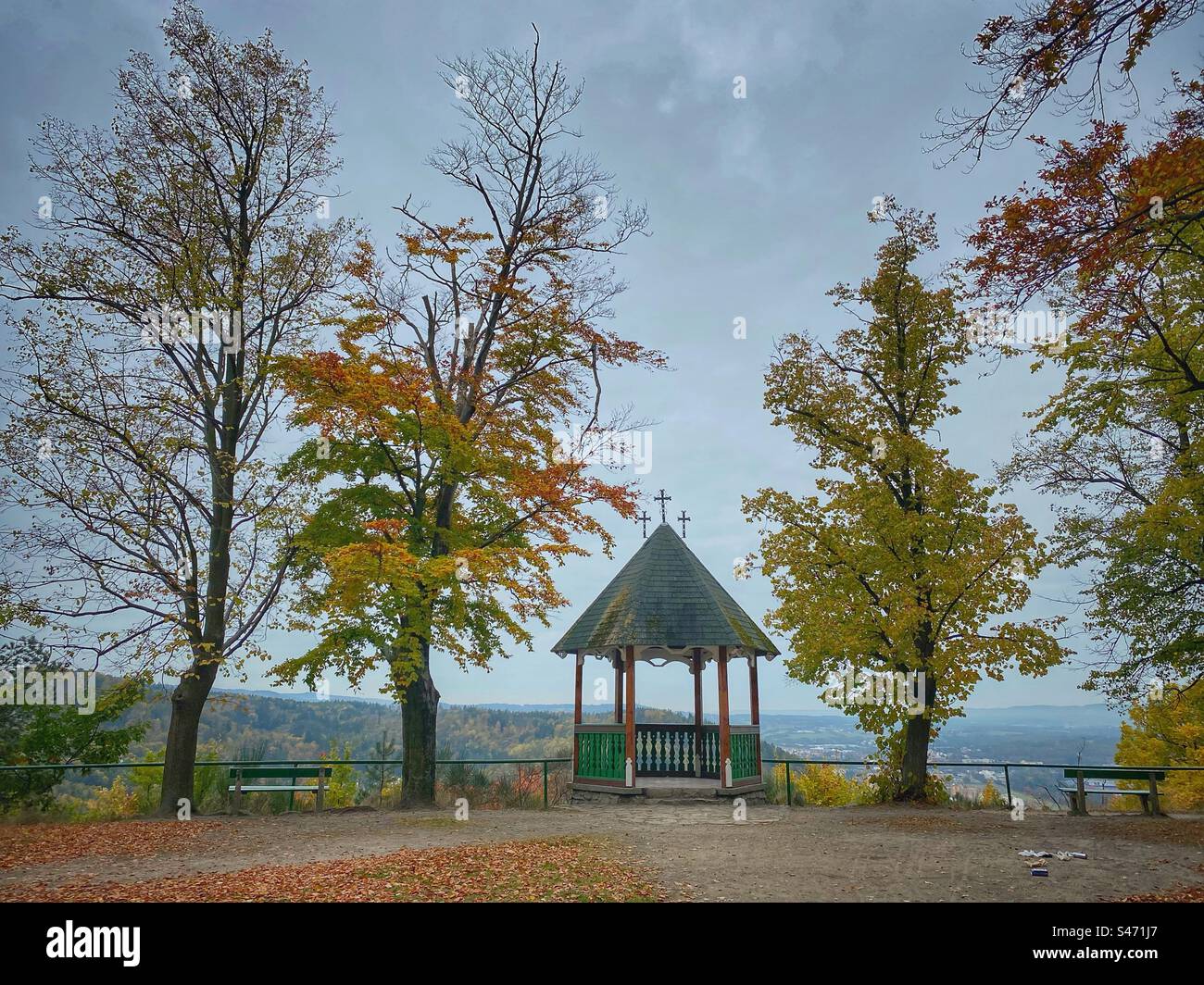 Three Crosses Lookout surrounded by autumn colored trees with beautiful views at Karlovy Vary, Czech Republic. - Smartphone Captured Stock Image