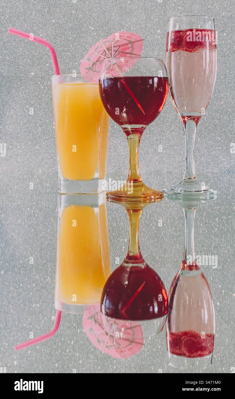 Fruity cocktails reflected in a mirror Stock Photo