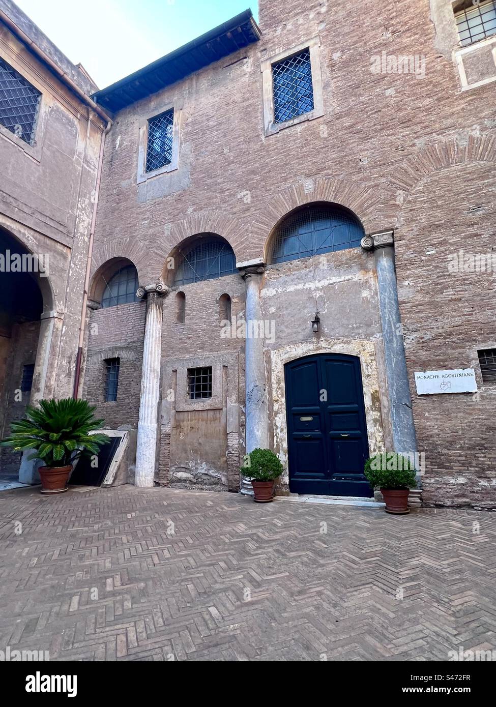 Courtyard of the Basilica dei Santi Quattro Coronati complex Stock