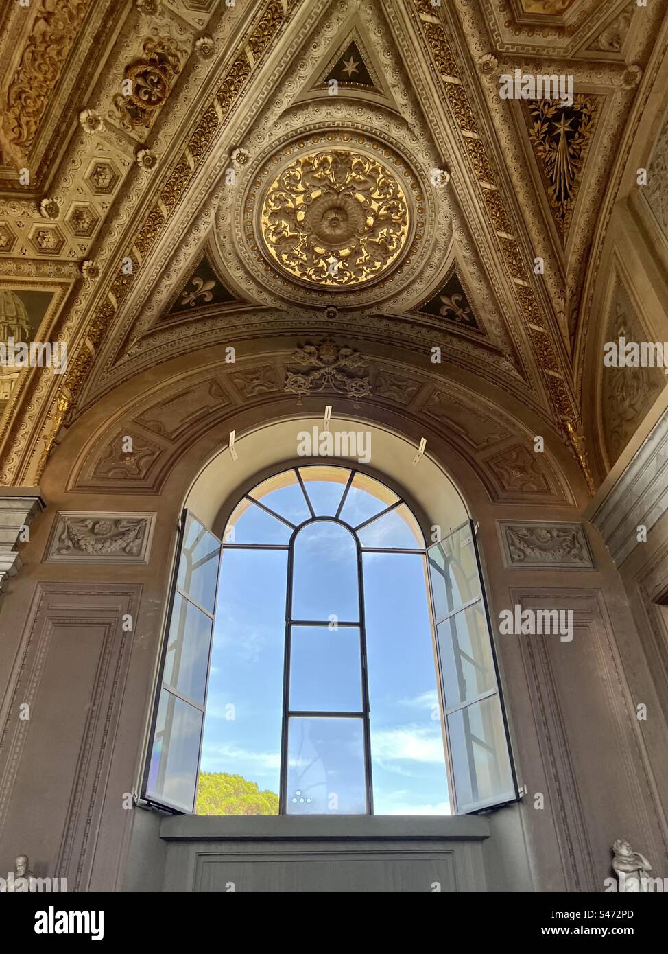 Ornate ceiling over a window inside the Vatican museums - Smartphone Captured Stock Image