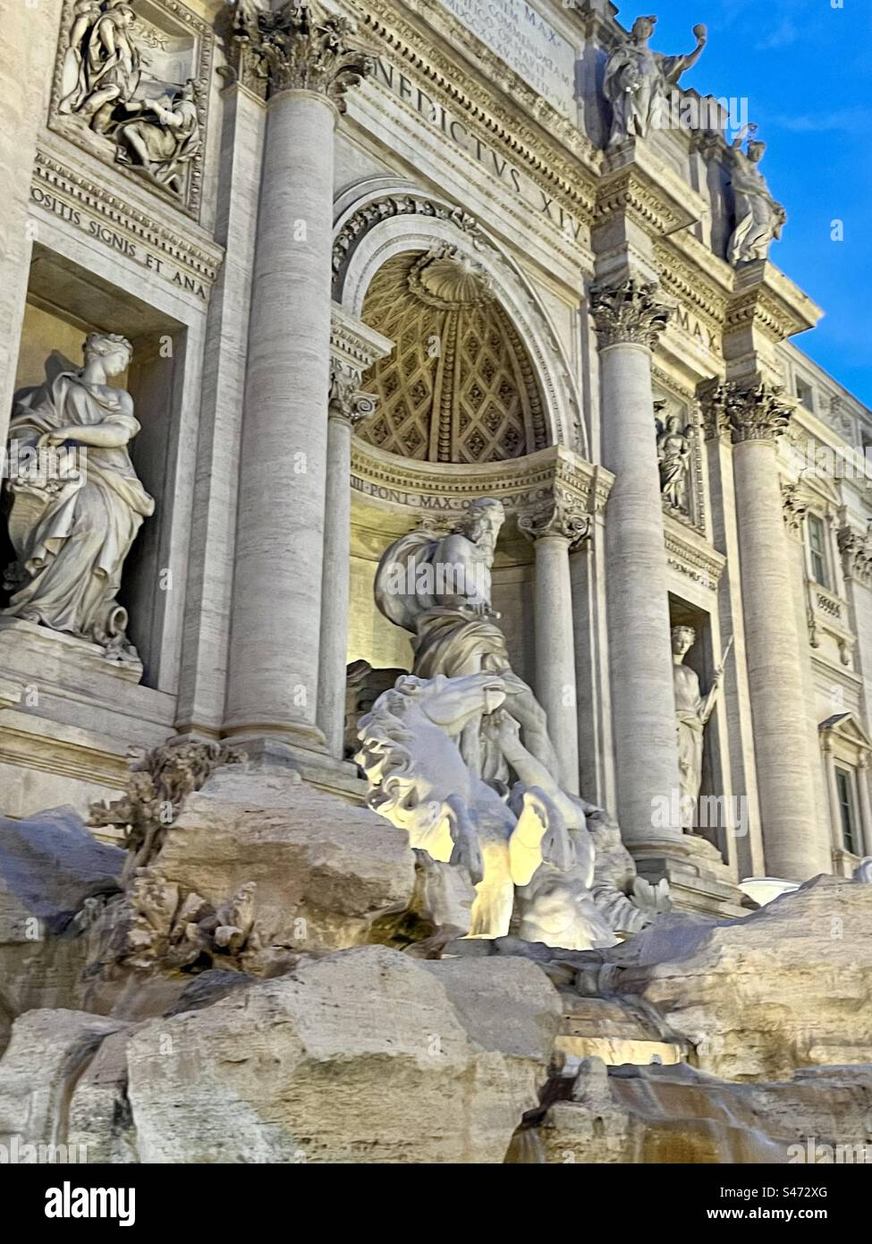 Details of the awe-inspiring architectural design of the Trevi Fountain, Rome. - Smartphone Captured Stock Image