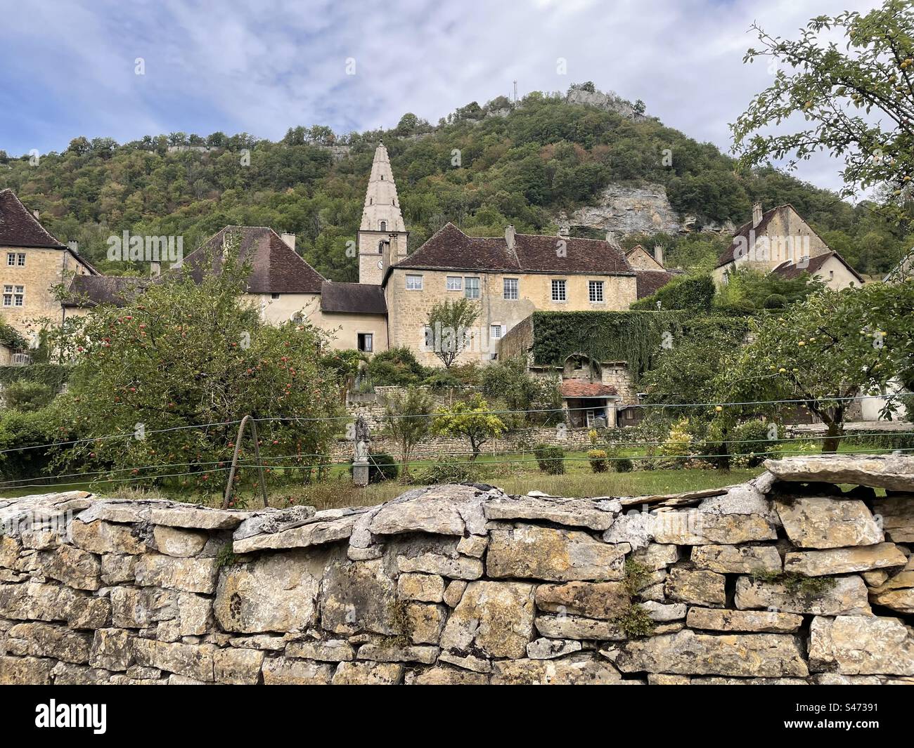 Baumé les Messieurs, town and Abbey, department Jura, France Stock Photo