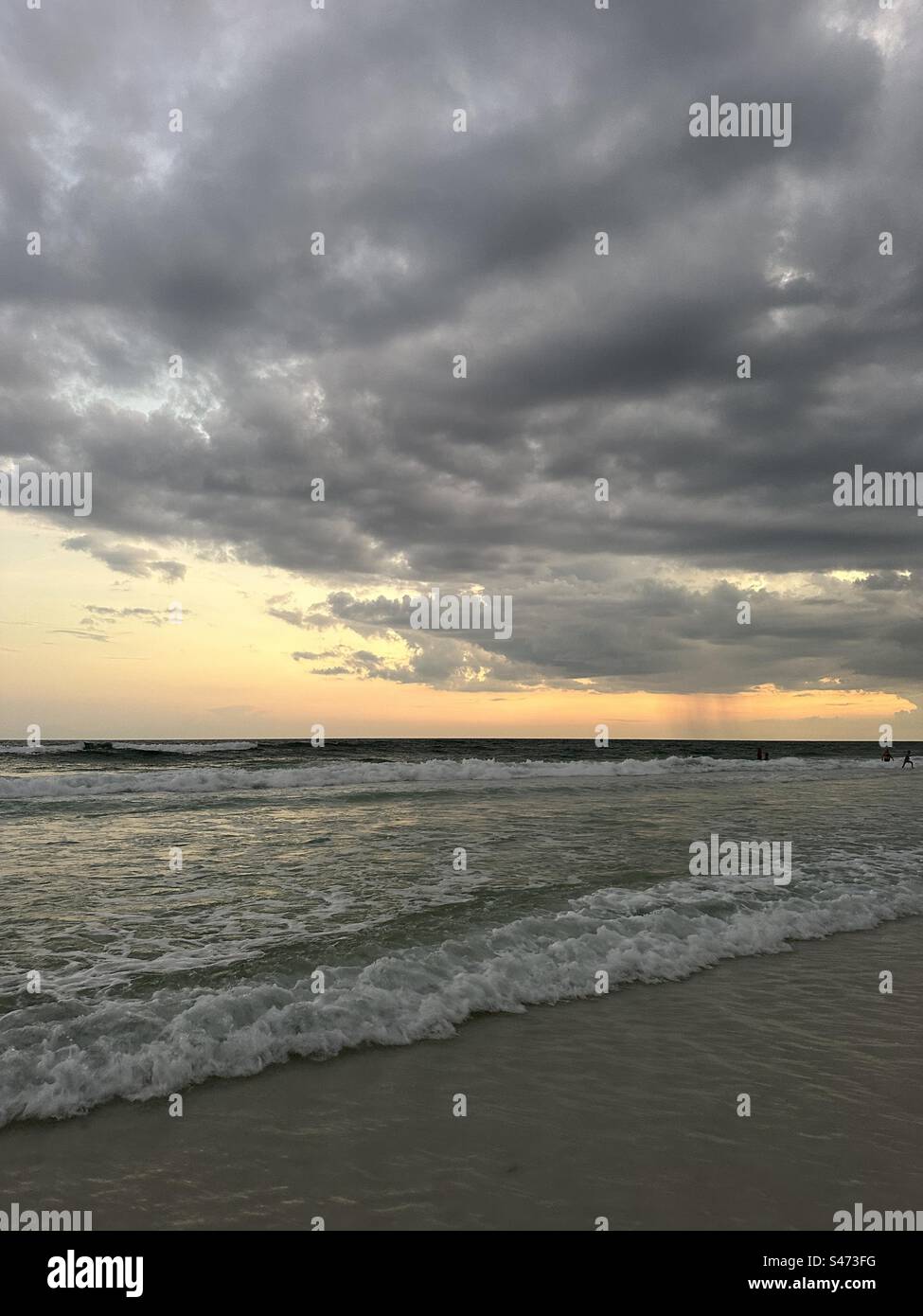 Dark dramatic sunset clouds over the Gulf of Mexico Florida Emerald Coast - Smartphone Captured Stock Image Dark dramatic sunset clouds over the Gulf of Mexico Florida Emerald Coast - Smartphone Captured Stock Image