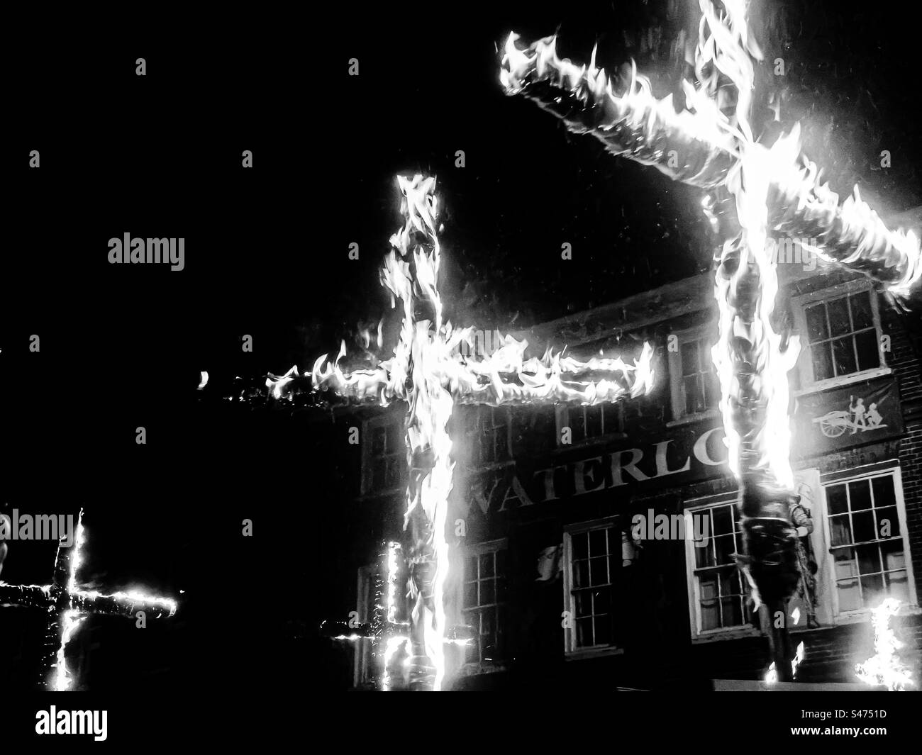 Flaming torch during parade at Lewes Bonfire, November 2022 - Smartphone Captured Stock Image